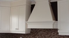 Transitional Kitchen coloured lacquer wood hood